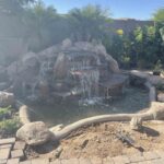 View of rock waterfall and landscaped pond